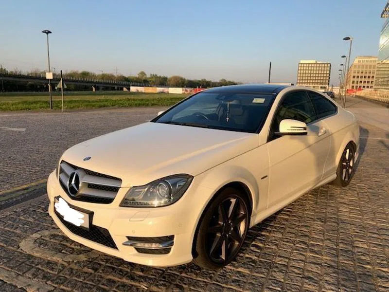 Adam’s white Mercedes C350, the car behind the Myst Auto story